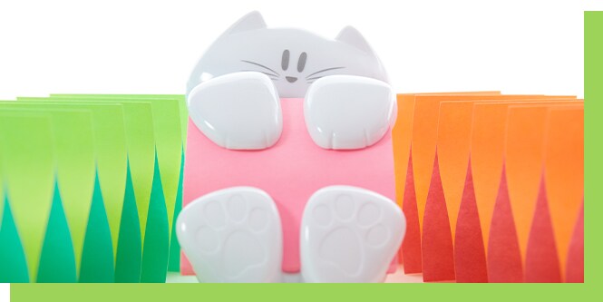 Post-it® Dispenser, Sticky Note Holder, White Cat Design, orange and green notes surrond.
